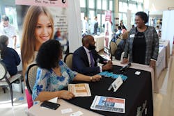 From left to right, Palm Tran DBE Grants Coordinator Claudia Salazar and Executive Director Clinton B. Forbes answer questions from vendors. From left to right, Palm Tran DBE Grants Coordinator Claudia Salazar and Executive Director Clinton B. Forbes answer questions from vendors.