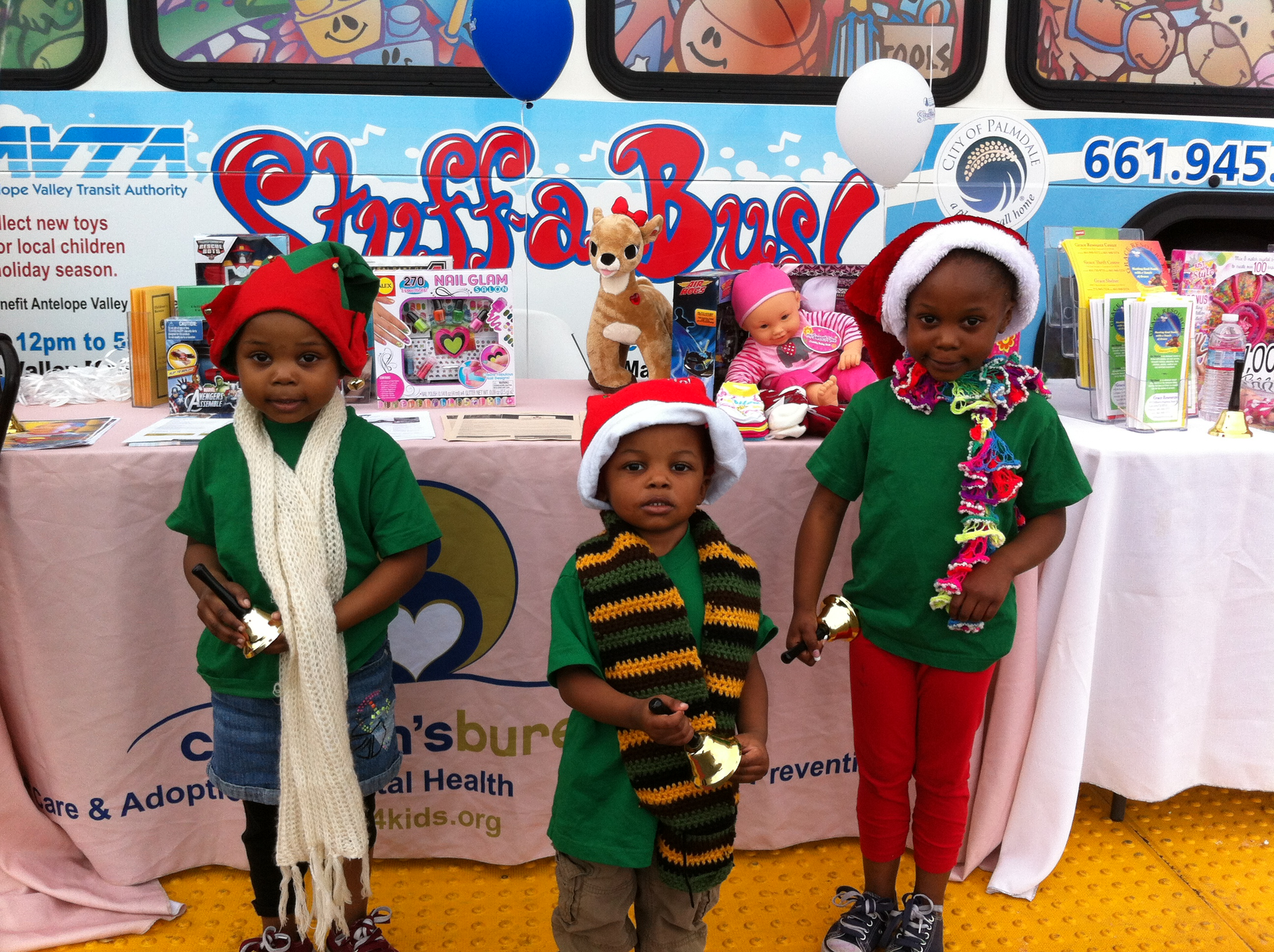 Kids at AVTA's Stuff-A-Bus holiday toy drive.
