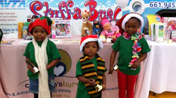 Kids at AVTA's Stuff-A-Bus holiday toy drive.