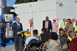 Omnitrans CEO/General Manager P. Scott Graham addresses crowd at CNG fueling system completion. Omnitrans CEO/General Manager P. Scott Graham addresses crowd at CNG fueling system completion.