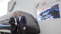 CEO of Virgin Hyperloop One, Rob Lloyd and CEO of HERE Technologies Edzard Overbeek at the unveiling of the first-generation pod at CES 2018.