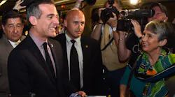 Los Angeles Mayor and Metro Board Chair Eric Garcetti Rides the Metro Red Line subway handing out complimentary 25th Birthday TAP cards to riders.