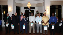 From left: Maintenance Technician Ricardo Ortega, Customer Service Supervisor Jeff McGregor, Executive Director Clinton B. Forbes, Reservation Specialist Johnny Paccha, Bus Operator Sookdeo Persad, Bus Operator Jose Hernandez, Bus Operator Eric Calssado, and Maintenance Worker Andrew Robinson at Palm Tran Employee Recognition and Awards Reception.