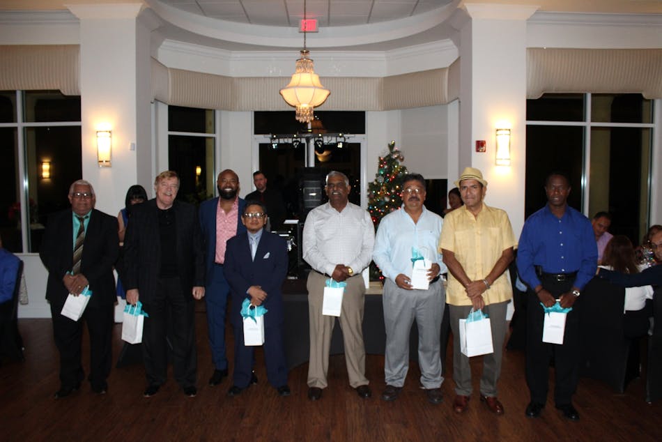 From left: Maintenance Technician Ricardo Ortega, Customer Service Supervisor Jeff McGregor, Executive Director Clinton B. Forbes, Reservation Specialist Johnny Paccha, Bus Operator Sookdeo Persad, Bus Operator Jose Hernandez, Bus Operator Eric Calssado, and Maintenance Worker Andrew Robinson at Palm Tran Employee Recognition and Awards Reception.