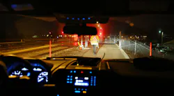 BART engineers work in the field as well as in the office, such as the engineer shown here in reflective vest preparing to oversee track work during the overnight period when BART trains are not in service.