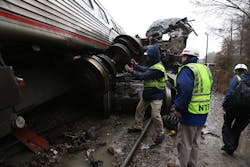 NTSB investigators assess the damage caused by the collision of an Amtrak train and a CSX train Feb. 4, 2018. NTSB investigators assess the damage caused by the collision of an Amtrak train and a CSX train Feb. 4, 2018.