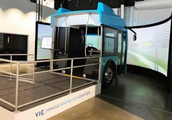 The simulator, designed and installed by FAAC Inc. using a 180-degree screen display and 4K projection system, is one of the first in the world to use full-scale original equipment manufacturer components to control the bus simulator. The simulator, designed and installed by FAAC Inc. using a 180-degree screen display and 4K projection system, is one of the first in the world to use full-scale original equipment manufacturer components to control the bus simulator.