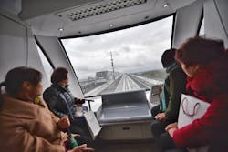 The new line is notably a driverless rubber-tire Automated People Mover (APM) system. The new line is notably a driverless rubber-tire Automated People Mover (APM) system.