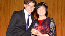 Joseph Weilgus, the founder of Project Sunshine presents the prize to Stella Li.
