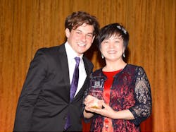 Joseph Weilgus, the founder of Project Sunshine presents the prize to Stella Li. Joseph Weilgus, the founder of Project Sunshine presents the prize to Stella Li.