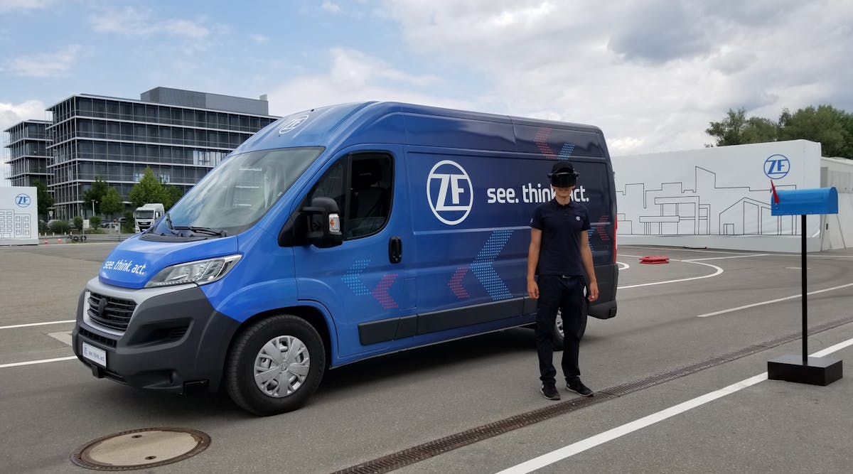 In ZF&apos;s Innovation Van, autonomous technology is used to improve the first-last mile efficiency of package delivery. (For the demonstration, the face shield worn is different than their actual design which more closely resembles glasses. They could not be shown due to propriety information.)