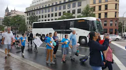 MCI's new D45 CRT LE Commuter Coach joined the July 24 March to the U.S. Capitol sponsored by the National Council on Independent Living.