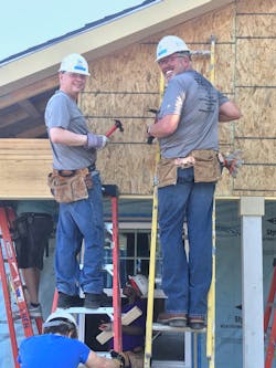 Trinity Metro President/CEO Paul J Ballard and Senior Vice President Bob Baulsir working on the TEXRail-sponsored Trinity Habitat for Humanity house in Fort Worth, Texas. Trinity Metro President/CEO Paul J Ballard and Senior Vice President Bob Baulsir working on the TEXRail-sponsored Trinity Habitat for Humanity house in Fort Worth, Texas.