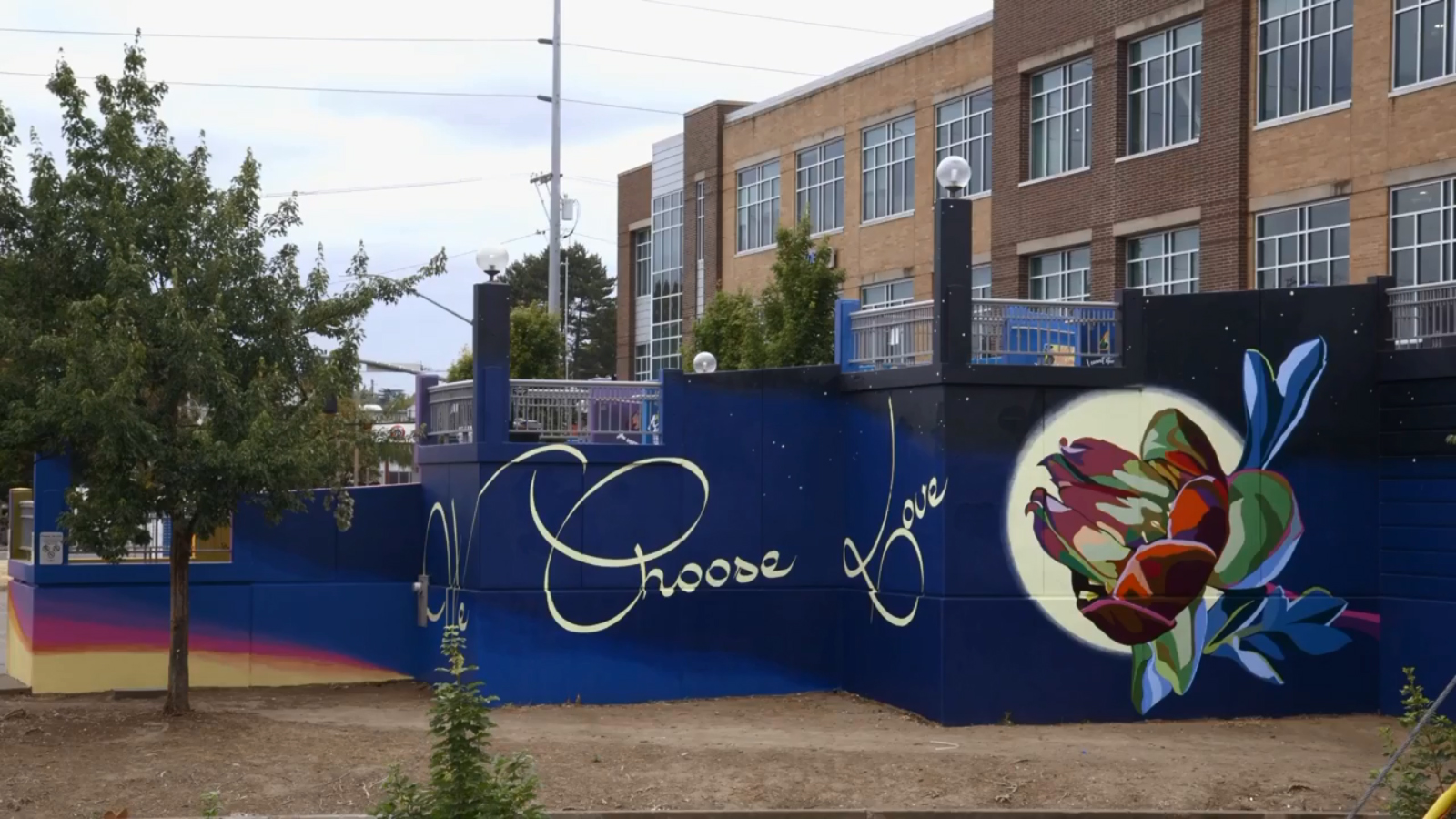 To honor the lives lost, the strength of those who stood up to hate and the emotional outpouring in the days after the attack on TriMet on May 26, 2017, artist Sarah Farahat and her team created a mural entitled &ldquo;We Choose Love.&rdquo;