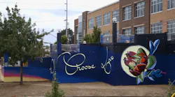 To honor the lives lost, the strength of those who stood up to hate and the emotional outpouring in the days after the attack on TriMet on May 26, 2017, artist Sarah Farahat and her team created a mural entitled “We Choose Love.”