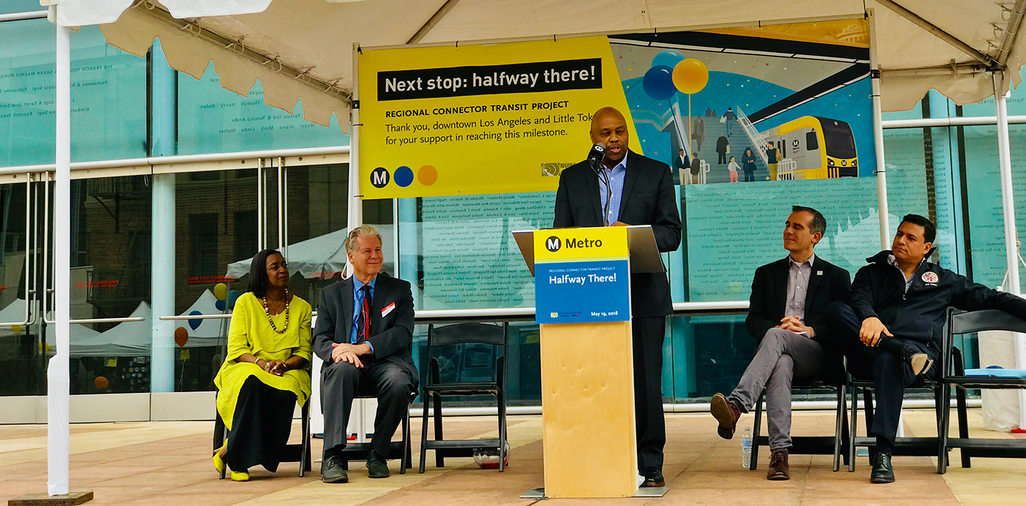 Philip Washington, CEO of LA Metro, addresses the celebration of the halfway milestone for the Los Angeles Regional Connector project.