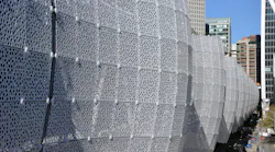 The Transit Center's airy metal skin puts a pretty face on a work horse third-floor bus deck that will accommodate buses operated by several regional transit systems.