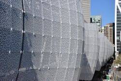 The Transit Center's airy metal skin puts a pretty face on a work horse third-floor bus deck that will accommodate buses operated by several regional transit systems. The Transit Center's airy metal skin puts a pretty face on a work horse third-floor bus deck that will accommodate buses operated by several regional transit systems.