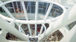 A four-story elliptical oculus skylight is encircled by an 180-foot-long LED screen displaying scrolling digital text, an installation by artist Jenny Holzer. A four-story elliptical oculus skylight is encircled by an 180-foot-long LED screen displaying scrolling digital text, an installation by artist Jenny Holzer.