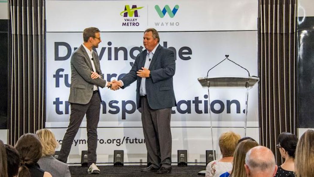 Shaun Stewart, Waymo chief business development officer and Scott Smith, Valley Metro CEO, forge a partnership to help drive the future of transportation.