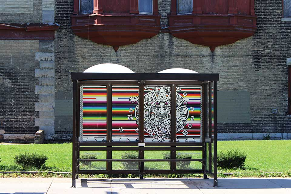 After a bizarre series of twists and turns, a beautiful piece of artwork that was stolen from a MCTS bus shelter is back up where it belongs.