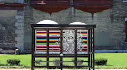 After a bizarre series of twists and turns, a beautiful piece of artwork that was stolen from a MCTS bus shelter is back up where it belongs.
