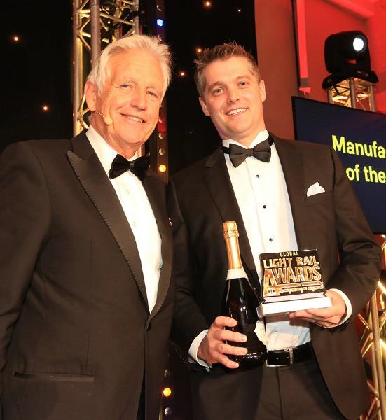 Brookville&rsquo;s Vice President of Business Development Joel McNeil accepted the Global Light Rail Award for Manufacturer of the Year at an Oct. 3 banquet in London.