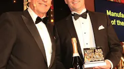 Brookville’s Vice President of Business Development Joel McNeil accepted the Global Light Rail Award for Manufacturer of the Year at an Oct. 3 banquet in London.