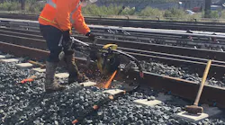A newly installed rail is welded during work at Harold Interlocking in October 2018.