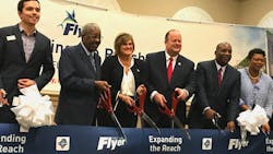 FTA Acting Administrator K. Jane Williams, center, joins representatives from the Jacksonville Transportation Authority at the launch of First Coast Flyer Bus Rapid Transit Red Line.