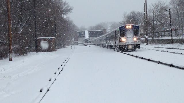 A Metro-North Harlem Line train is shown operating in snowy weather in this 2014 image.