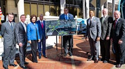 From left to right, Florida State Rep. Wyman Duggan, Jacksonville Mayor Lenny Curry, Secretary Elaine Chao, JTA CEO Nathaniel Ford, U.S. Rep. Al Lawson, JTA Chairman Kevin Holzendorf, Jacksonville City Council President Aaron Bowman, U.S. Rep. John Rutherford.