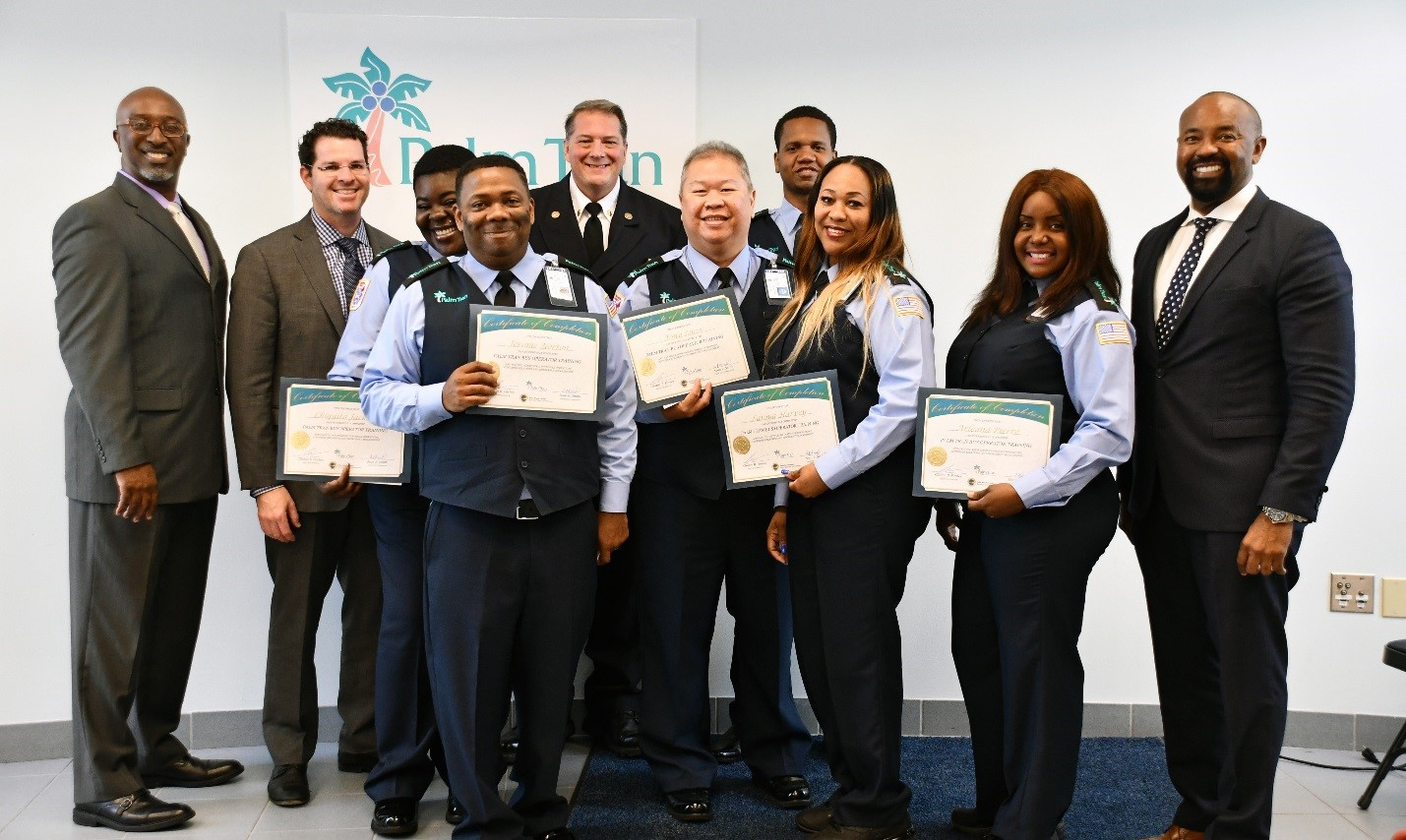 From L to R: Palm Tran Senior Manager of Operations Steven Fields, Assistant Palm Beach County Administrator Todd Bonlarron, Palm Beach County Fire-Rescue Chief Mike Mackey, Bus Operator Judeley Cantave, Bus Operator Chiquita Jackson, Bus Operator Jerome Norton, Bus Operator Tony Dino, bus operator Latoya Harvey, Bus Operator Arleanna Pierre and Palm Tran Executive Director Clinton B. Forbes.