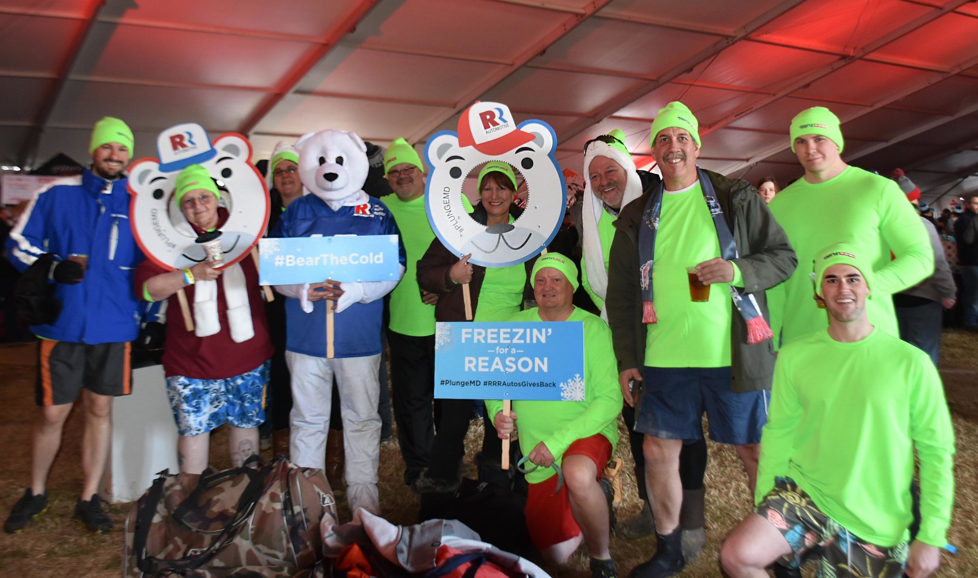 Team Stertil-Koni poses with the Maryland State Police Polar Bear Plunge mascot Beary White pre-plunge.