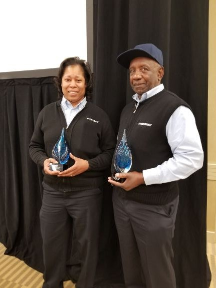 Raimey and Williams accepting their awards.