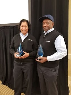 Raimey and Williams accepting their awards. Raimey and Williams accepting their awards.
