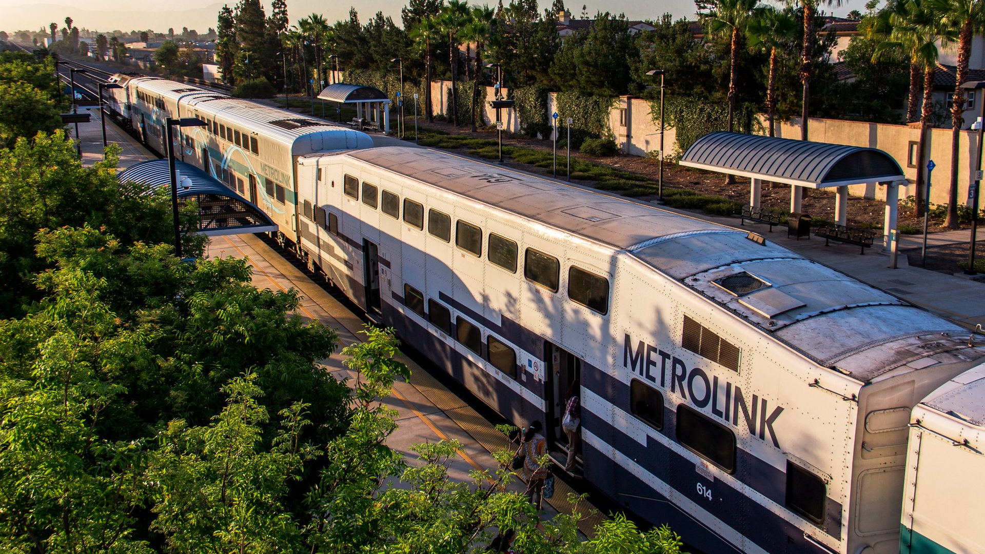 Passengers board one of the Sentinel rail cars operated by Metrolink in this September 2018 image.