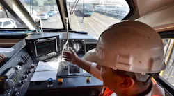 In this 2012 image, Metrolink's Neil Brown shows PTC technology in a locomotive.