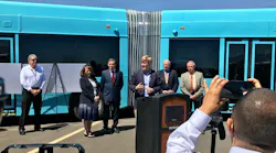 Officials debut the demo 60-foot articulated bus that will serve ART routes.