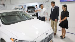 Mobileye Founder and CEO Amnon Shashua, left, provides a tour of the company&apos;s Jerusalem facility to New York Gov. Andrew Cuomo on June 28.