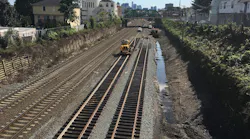 GLX Constructors install new interim track between Lowell Street and Washington Street in Somerville in this September 2018 photo. The new track will support MBTA Commuter Rail service while the existing tracks are removed to accommodate wall and utility construction. The project was approved for $1.1 billion in funding as part of the MassDOT/MBTA five-year CIP in June 2019.