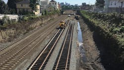 GLX Constructors install new interim track between Lowell Street and Washington Street in Somerville in this September 2018 photo. The new track will support MBTA Commuter Rail service while the existing tracks are removed to accommodate wall and utility construction. The project was approved for $1.1 billion in funding as part of the MassDOT/MBTA five-year CIP in June 2019. GLX Constructors install new interim track between Lowell Street and Washington Street in Somerville in this September 2018 photo. The new track will support MBTA Commuter Rail service while the existing tracks are removed to accommodate wall and utility construction. The project was approved for $1.1 billion in funding as part of the MassDOT/MBTA five-year CIP in June 2019.