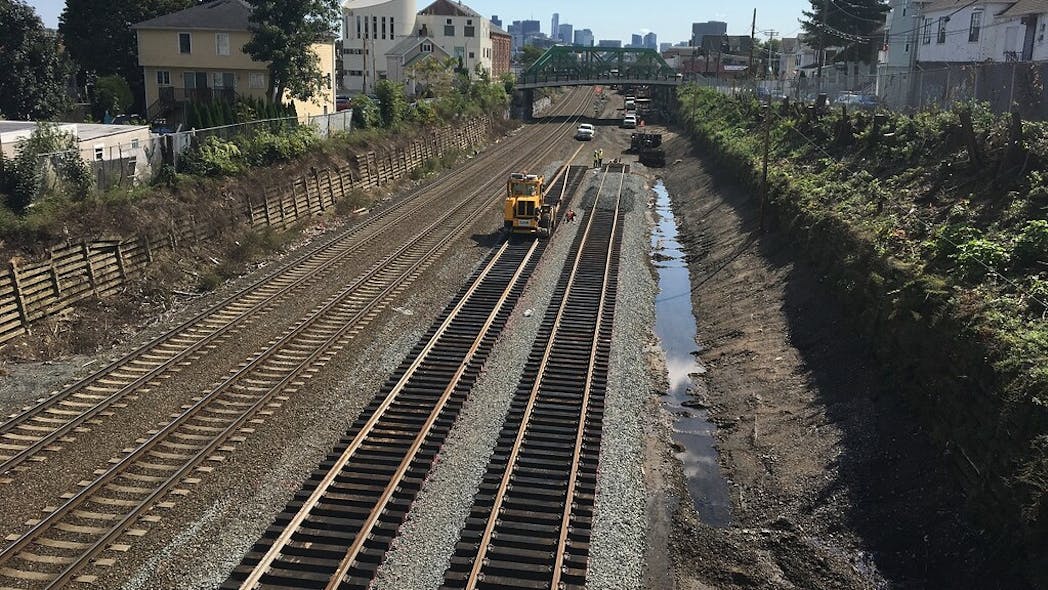 GLX Constructors install new interim track between Lowell Street and Washington Street in Somerville in this September 2018 photo. The new track will support MBTA Commuter Rail service while the existing tracks are removed to accommodate wall and utility construction. The project was approved for $1.1 billion in funding as part of the MassDOT/MBTA five-year CIP in June 2019.
