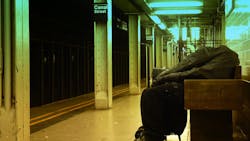 In this 2010 image, a homeless man sleeps on a bench on a NYC subway platform. In this 2010 image, a homeless man sleeps on a bench on a NYC subway platform.