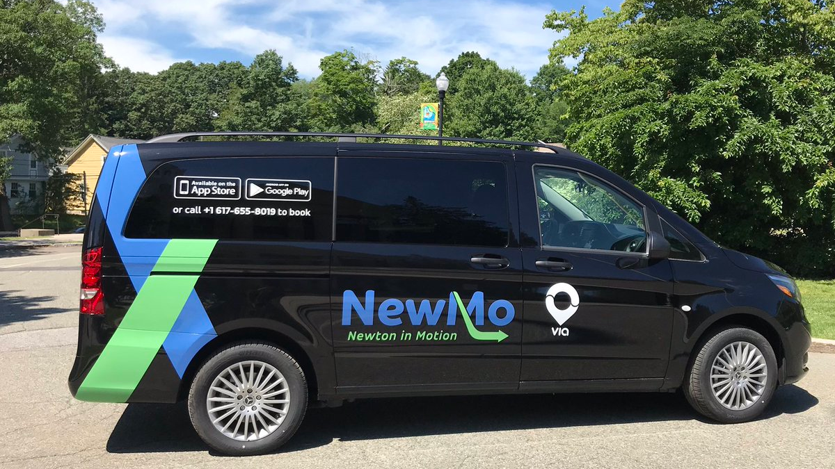 The new microtransit service in Newton, Mass., uses clearly marked vans and cars.