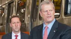 Gov. Charlie Baker outlines the plan to accelerate MBTA capital projects; MBTA General Manager Steve Poftak appears in the background.