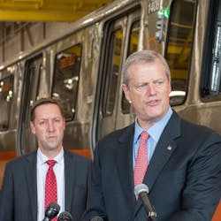 Gov. Charlie Baker outlines the plan to accelerate MBTA capital projects; MBTA General Manager Steve Poftak appears in the background. Gov. Charlie Baker outlines the plan to accelerate MBTA capital projects; MBTA General Manager Steve Poftak appears in the background.