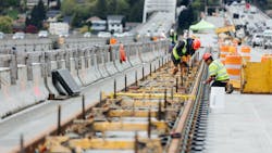 To accommodate future light-rail trains; the track must be secured to the bridge deck with lightweight concrete blocks and the trains will transition to the floating bridge over specialty track bridges.