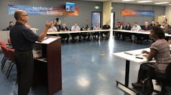 John Costa, at podium, international president of the Amalgamated Transit Union, speaks to participants of the Santa Clara VTA/ATU Joint Workforce program. John Costa, at podium, international president of the Amalgamated Transit Union, speaks to participants of the Santa Clara VTA/ATU Joint Workforce program.