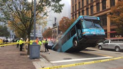 The Port Authority of Allegheny County bus dropped into the sinkhole while waiting at a red light on Oct. 28. The Port Authority of Allegheny County bus dropped into the sinkhole while waiting at a red light on Oct. 28.